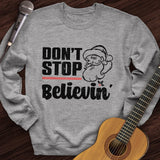 Don't Stop Believing Santa Crewneck